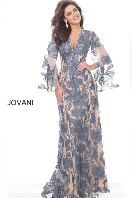 Model wearing Jovani 00752 elegant navy gown with lace detailing and bell sleeves.