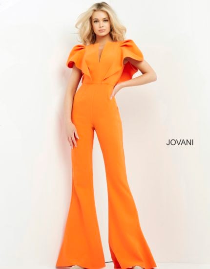 Model wearing Jovani 00762 orange jumpsuit with V-neckline and flutter sleeves, front view.