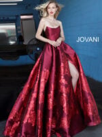 Model in Jovani 02038 elegant ball gown with stunning floral embroidery.