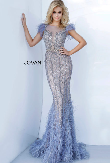 Model wearing Jovani 02326 vintage blue dress with intricate beadwork and feathers.