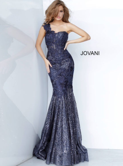 Model wearing Jovani 02445 Navy color gown with one-shoulder floral appliqué and sequins.