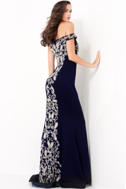 Model wearing Jovani 02576 navy gown, front view showing elegant fit and embroidered details.