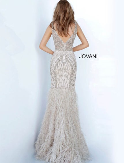 back view of model in Jovani 02798 silver mermaid gown with V-back