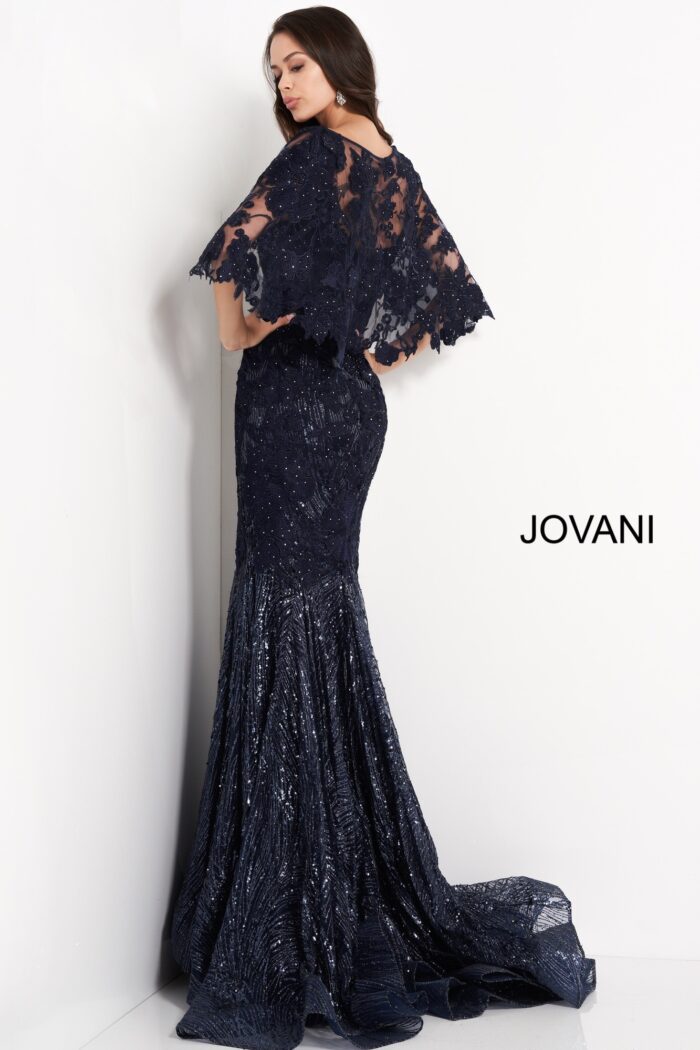 Model wearing Jovani 03158 Navy Cape Sleeve Lace Mother of the Bride Dress