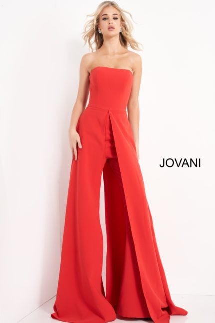 Model wearing Jovani 03529 red jumpsuit, front view, with strapless design and wide-leg silhouette.