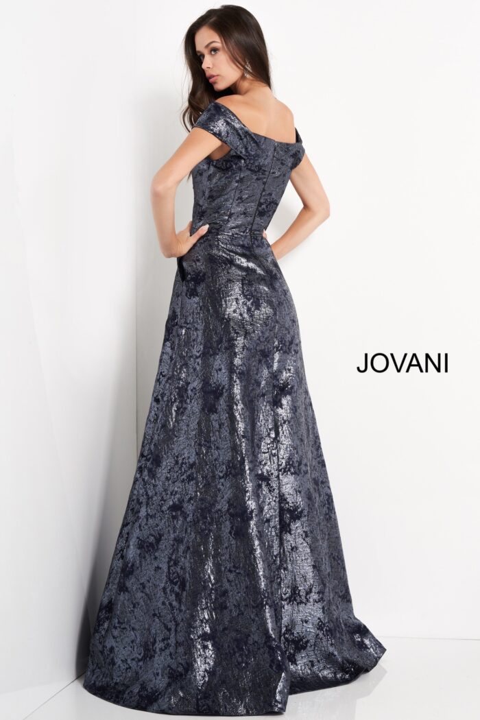 Model wearing Jovani 03674 Navy Metallic Off the Shoulder Evening Dress
