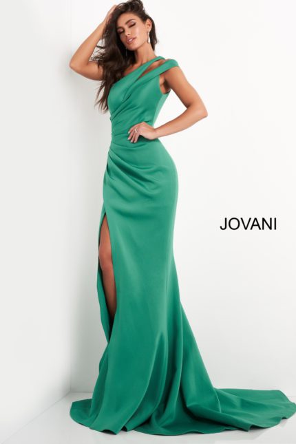 Model wearing Jovani 04222 green gown showcasing side profile with high slit.