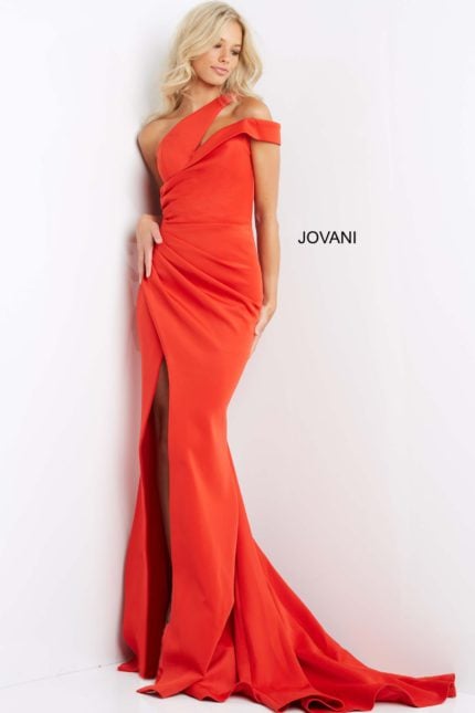 Model wearing Jovani 04222, an elegant orange gown with asymmetric neckline and high slit.