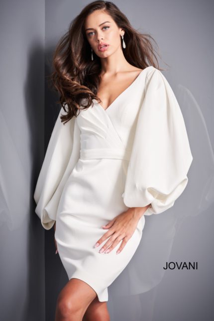 Model wearing Jovani 04370 white dress showcasing the deep V-neckline.