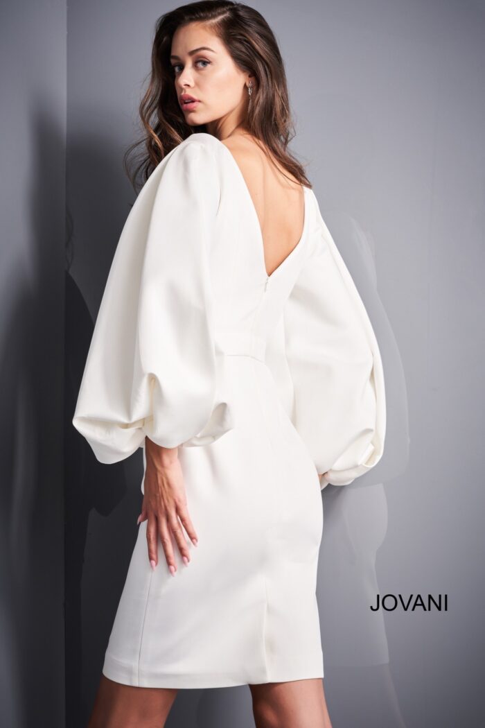 Model wearing Jovani 04370 White Long Sleeve Cocktail Dress