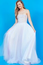 model wearing Jovani K02229 blue gown front view against blue background