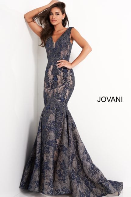 Model wearing Jovani 04585 navy gown, showing intricate lace detail.