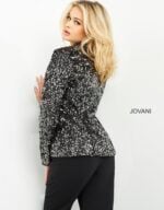 Model wearing Jovani 04825 black sequin dress, back view