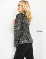 Model wearing Jovani 04825 black sequin dress, back view