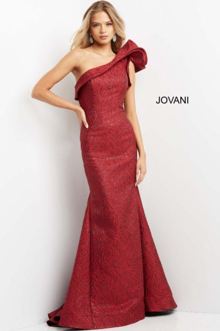 Model wearing Jovani 05176 burgundy dress with one-shoulder design and mermaid silhouette.