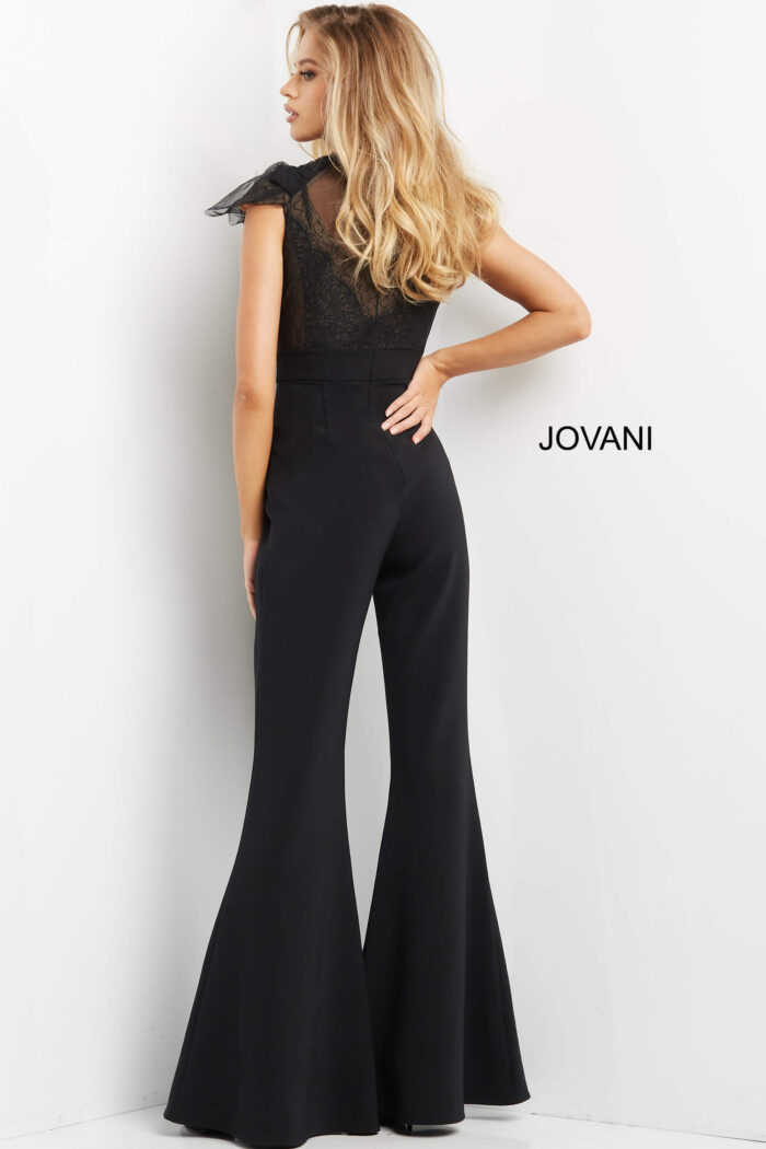Model wearing Jovani 05676 Black High Waist Cap Sleeve Jumpsuit