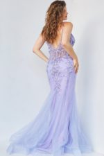 Back view of plus model in Jovani 05839 elegant mermaid gown in periwinkle.