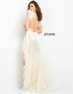 Back view of model in Jovani 06164 beige gown with open back.