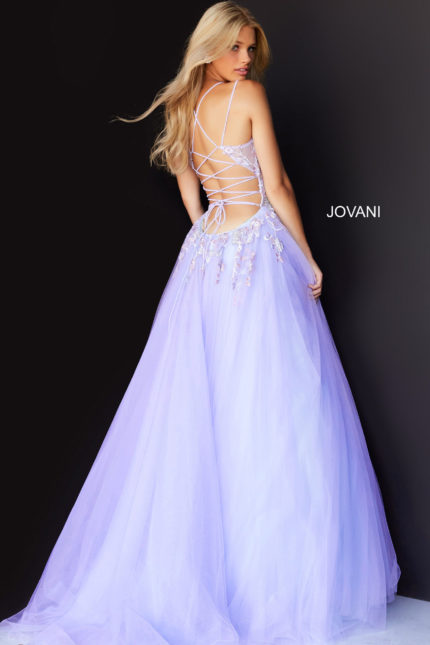 Model showcasing the back view of Jovani 06207 lilac gown with lace-up detailing.