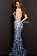 Back view of model posing in Jovani 06450 silver dress.