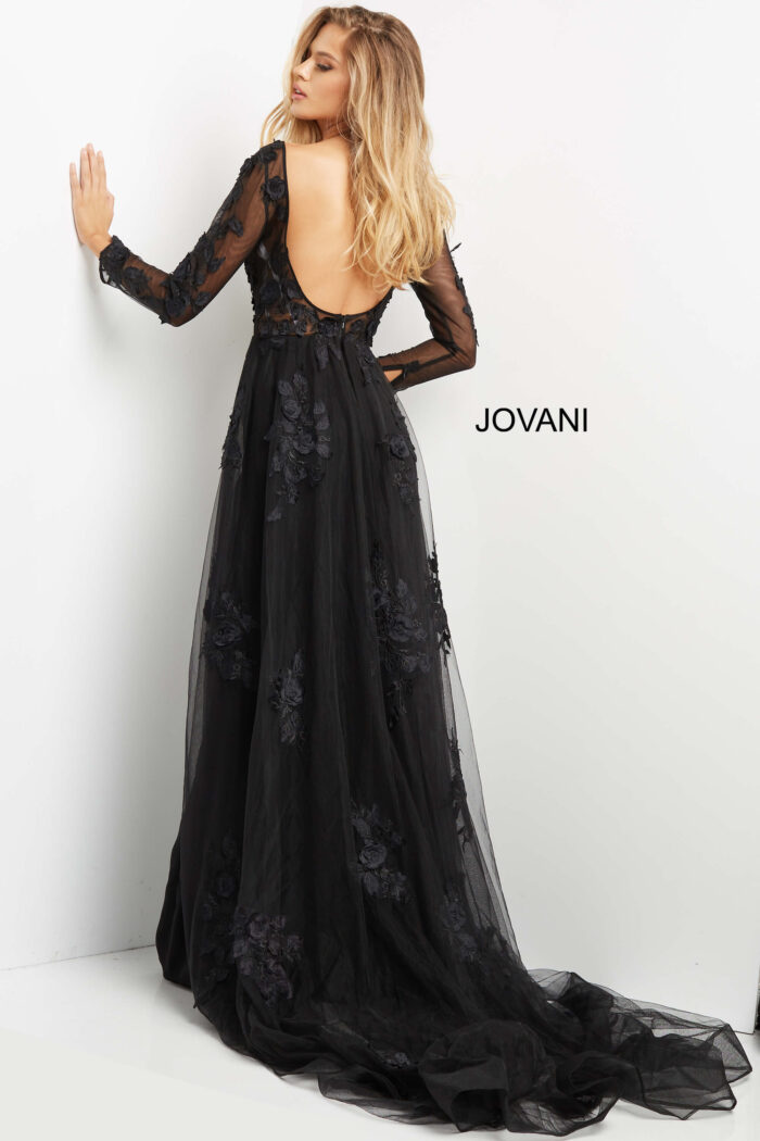 Model wearing Jovani 06609 Black Lace Bodice Long Sleeve Jumpsuit
