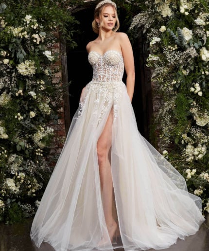 Front view of Jovani 06610 white gown with floral embroidery and high slit.