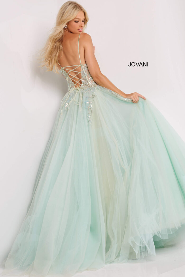 Model wearing Jovani 06816 Mint Illusion Bodice Ballgown