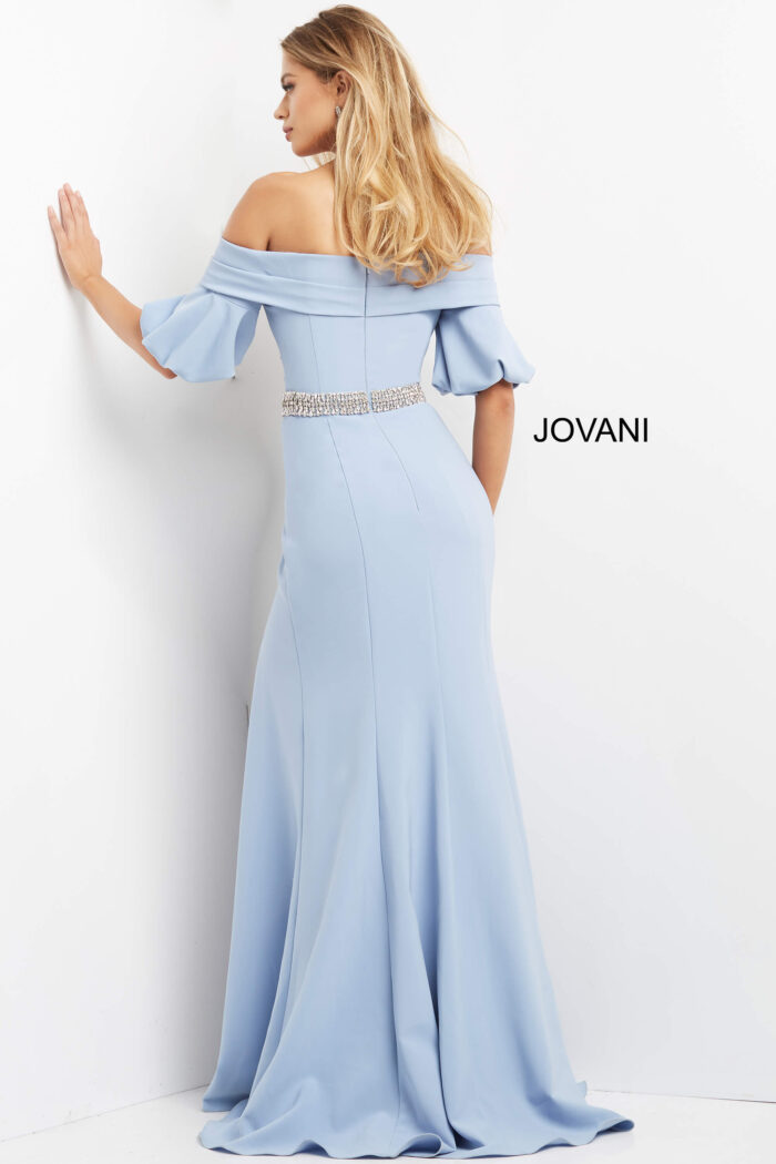 Model wearing Jovani 06830 Navy Off the Shoulder Embellished Belt Dress