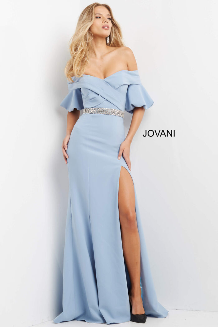 Model wearing Jovani 06830 Navy Off the Shoulder Embellished Belt Dress