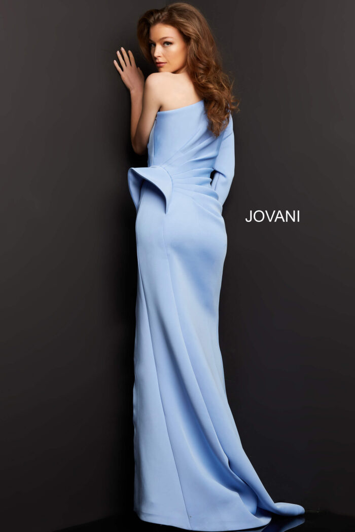 Model wearing Jovani 06998 Light Blue One Shoulder Long Sleeve Evening Gown