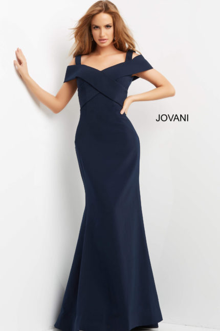 model wearing Jovani 06999 navy gown with mermaid silhouette and off-the-shoulder neckline