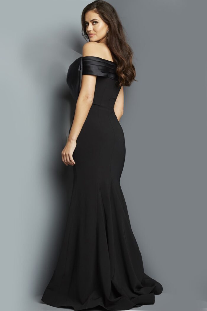 Model wearing Jovani 07014 Black Fitted Off the Shoulder Evening Dress