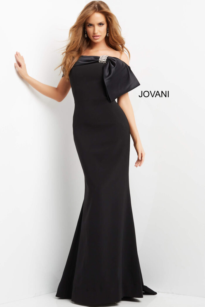 Model wearing Jovani 07014 Black Off the Shoulder Long Evening Gown