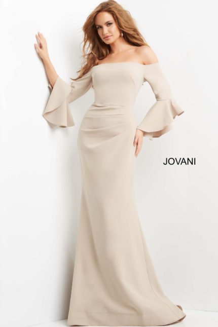 Model wearing Jovani 07065 elegant beige dress with off-the-shoulder neckline and flared sleeves.