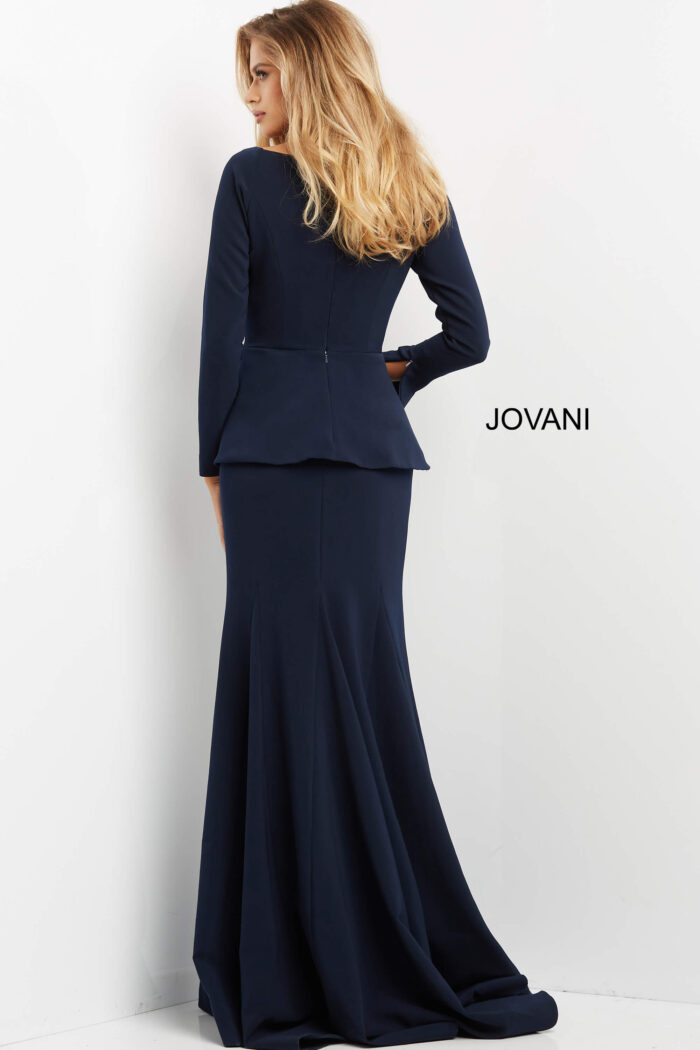Model wearing Jovani 07131 Navy Long Sleeve Peplum Dress