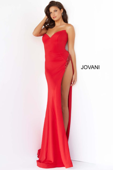 Model wearing Jovani 07138 red dress with sweetheart neckline and high slit from the front view.