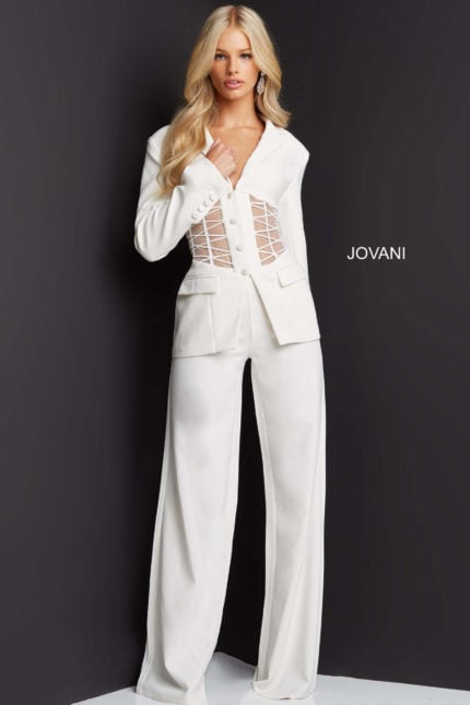 Model wearing Jovani 07227 ivory pantsuit featuring a sheer netted waist and wide-leg pants.