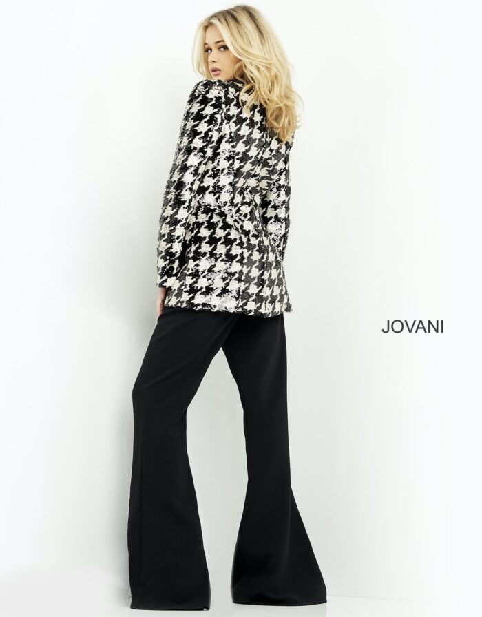 Model wearing Jovani 07239 Black Two Piece Contemporary Pant Suit