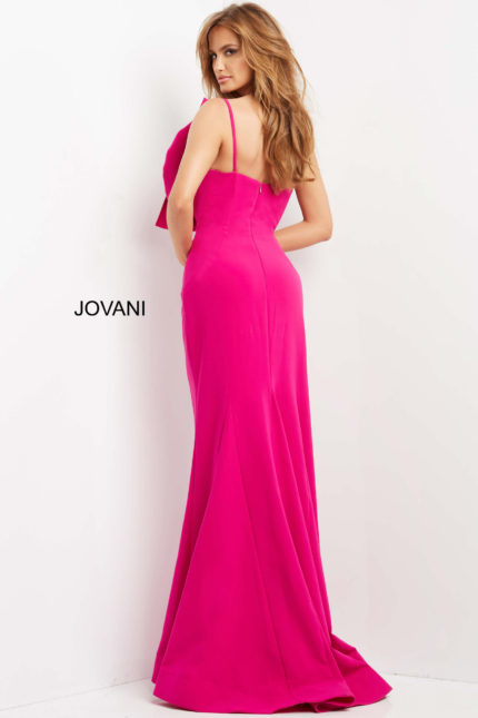 Model wearing Jovani 07306, fuchsia dress, back view with low cut and straps.