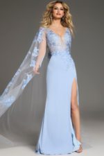 Model in Jovani 07399 blue gown showcasing floral embroidery and sheer sleeves