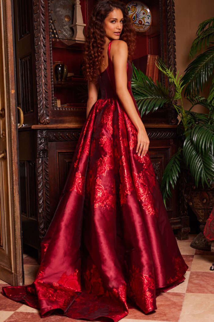 Model wearing Jovani 07441 Red Pleated Overskirt Sleeveless Prom Gown