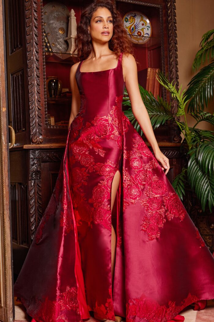 Model wearing Jovani 07441 Red Pleated Overskirt Sleeveless Prom Gown