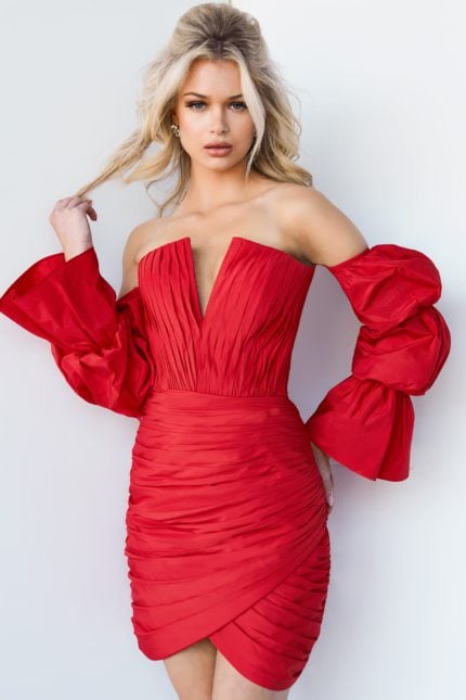 Model wearing Jovani 07558 red dress with plunge neckline and balloon sleeves, front view.