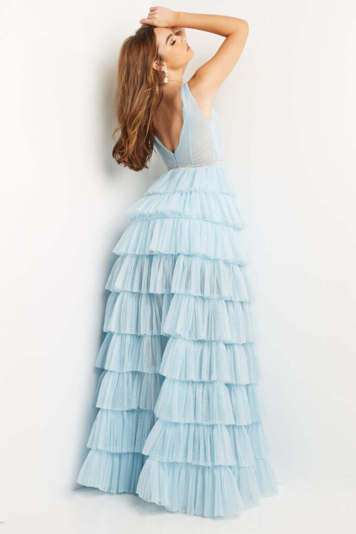 Model wearing Jovani 07998 Sky Blue Embellished Belt Layered Prom Ballgown
