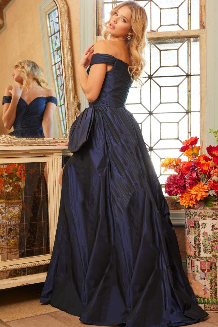Model wearing Jovani 08092 Sapphire Off the Shoulder Ruched Bodice Evening Gown