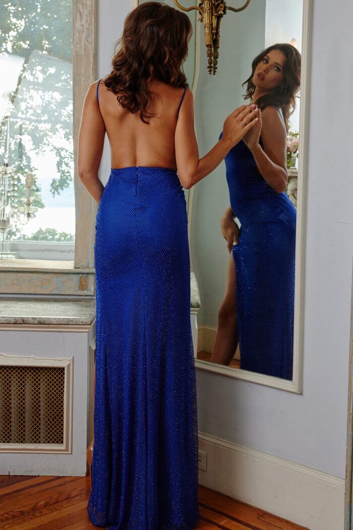 Model wearing Jovani 08531 Blue sexy Embellished Net Prom Dress
