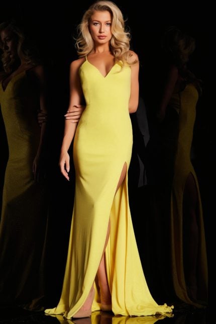 Model wearing Jovani 08153 yellow gown, front view with high slit and V-neckline.