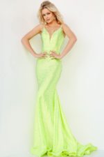 Model wearing Jovani 08157 neon green front view with plunging neckline.