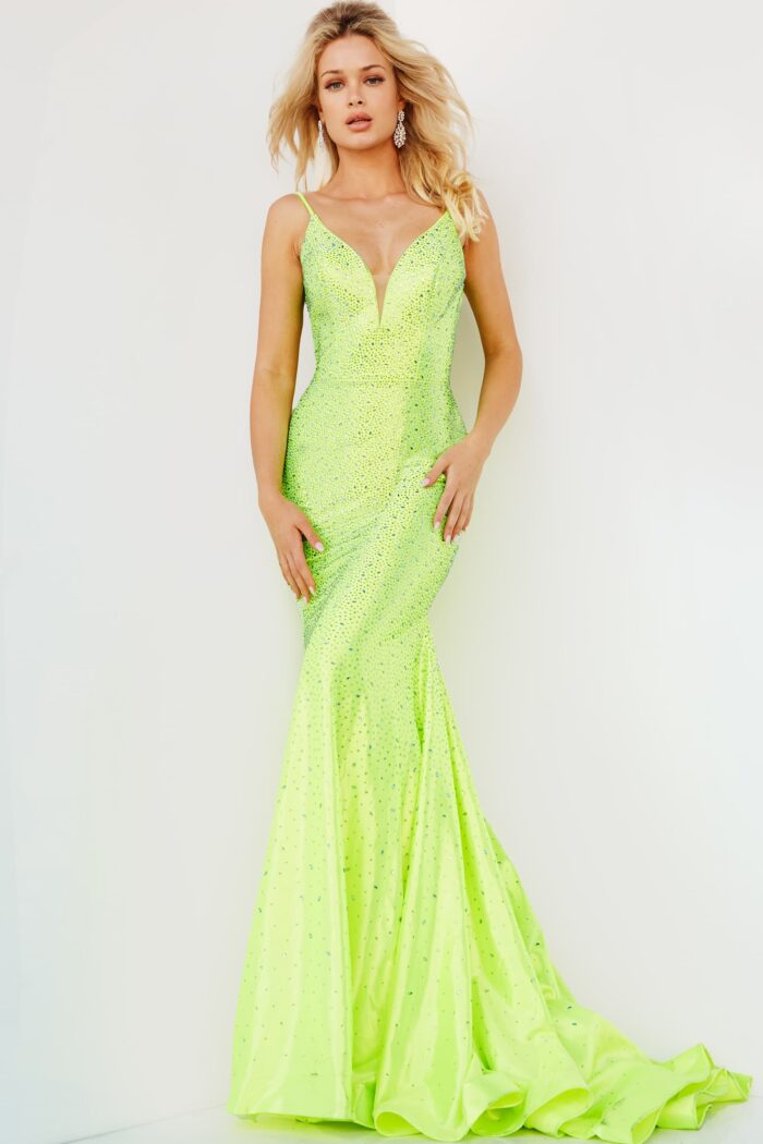 Model wearing Jovani 08157 Green Fully Embellished Open Back Dress