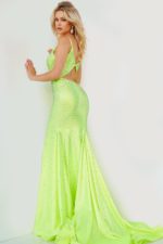 Model wearing Jovani 08157 neon green back view with cutout detail.